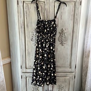 Black sun dress with flower pattern